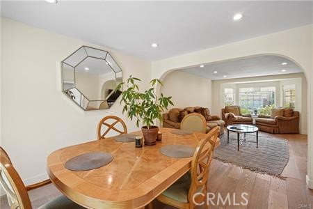 19849 Crystal Ridge Lane Porter Ranch, CA 91326 - Photo 8 of 29 a dining room with furniture and wooden floor