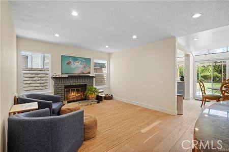 19849 Crystal Ridge Lane Porter Ranch, CA 91326 - Photo 10 of 29 a living room with furniture and a fireplace