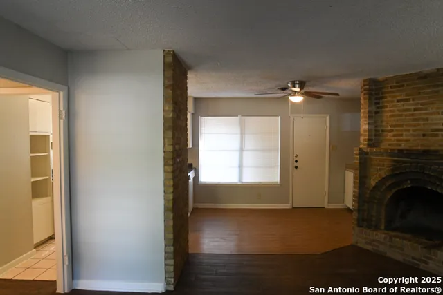 a view of livingroom and hardwood floor