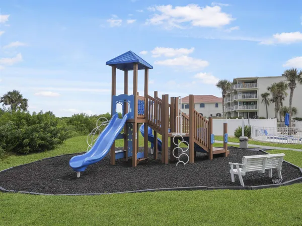 a view of a park with swings
