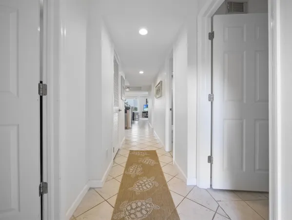 a view of a hallway with a furniture