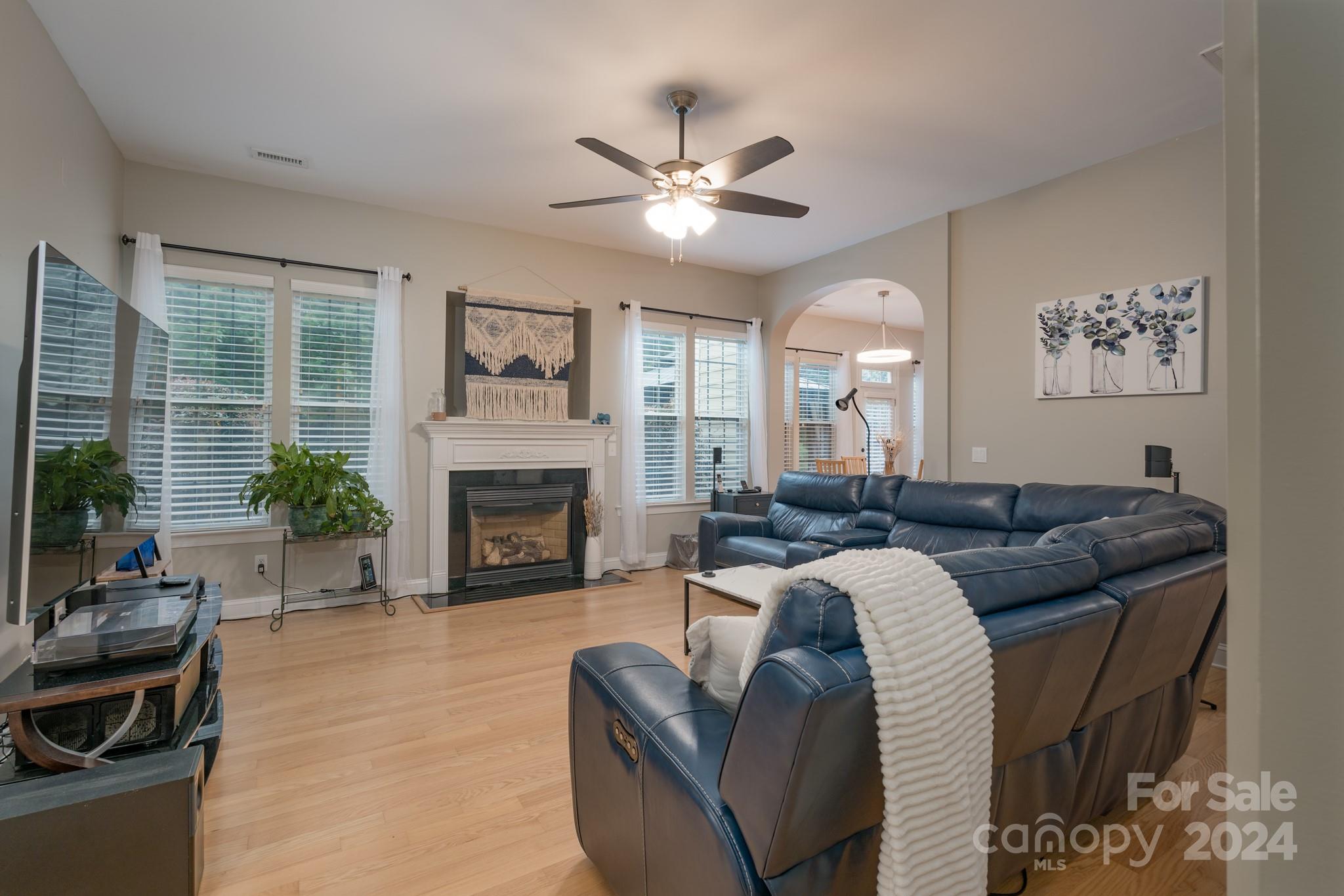 925 Treasure Court Fort Mill, SC 29708 - Photo 11 of 45 a living room with furniture and a fireplace