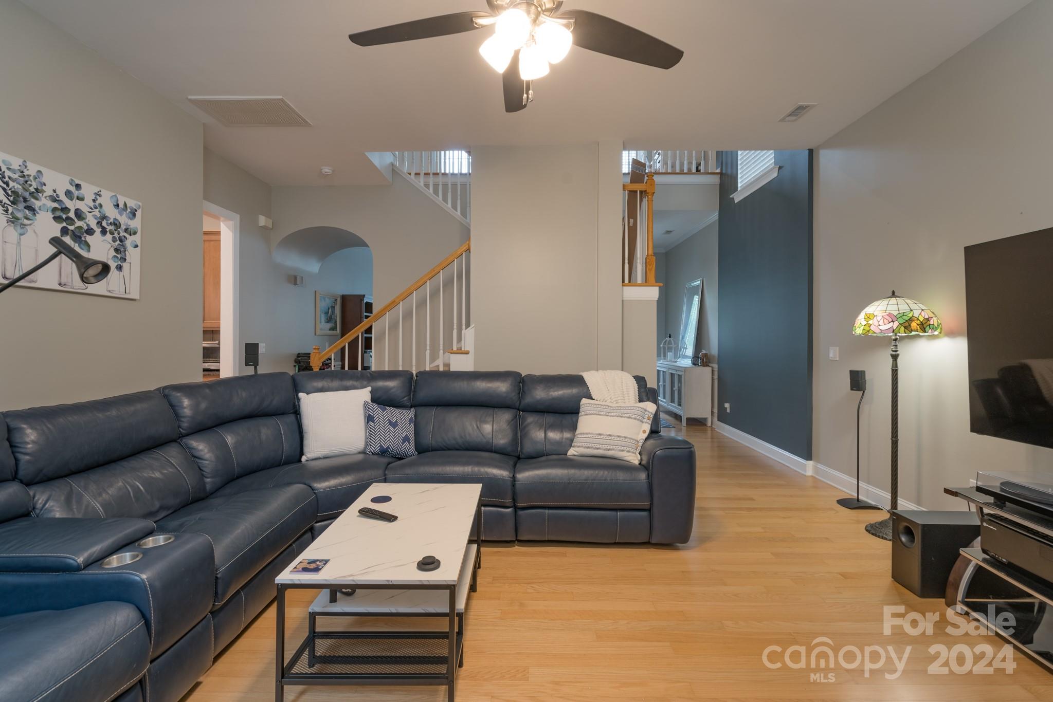 925 Treasure Court Fort Mill, SC 29708 - Photo 13 of 45 a living room with furniture and a flat screen tv