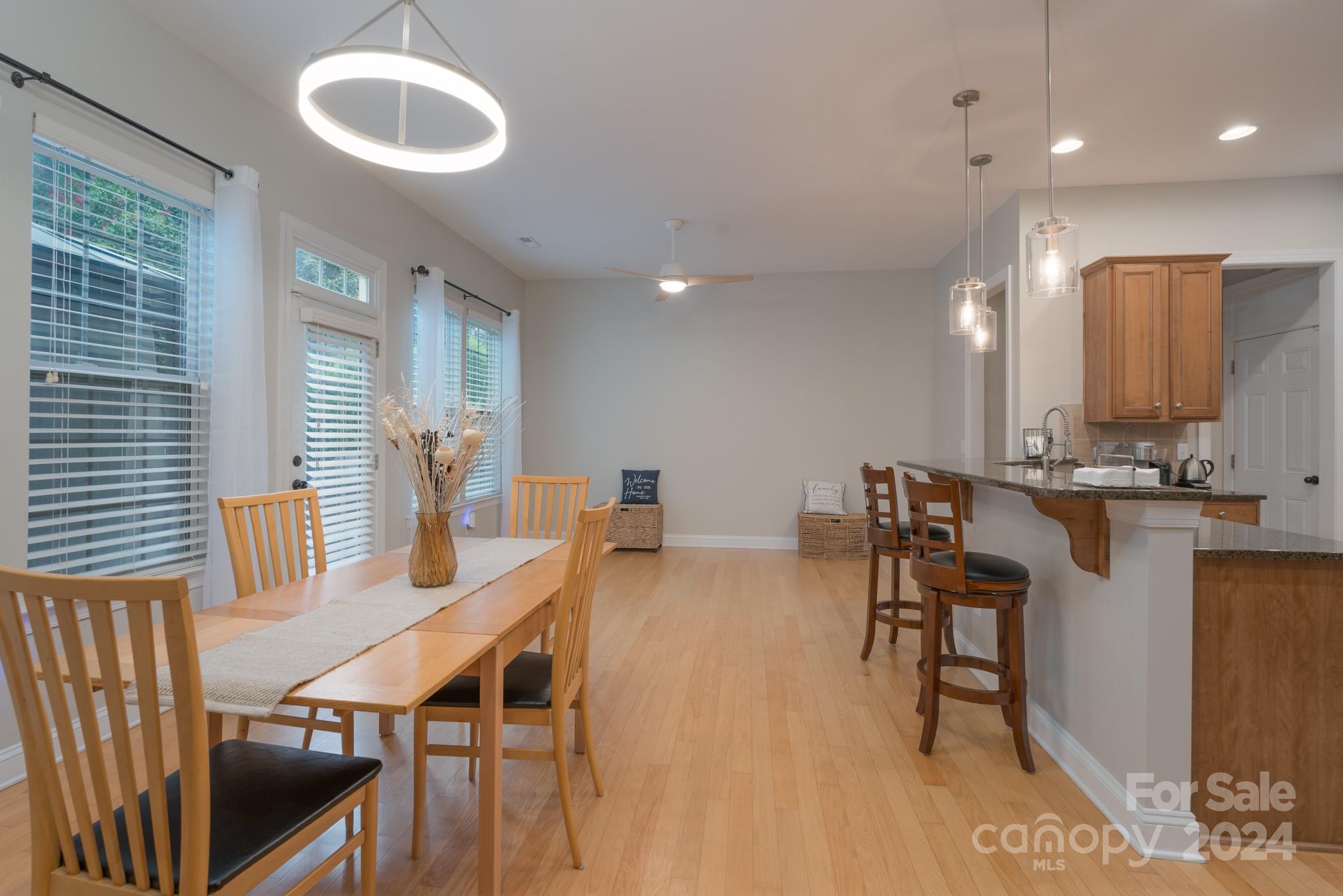 925 Treasure Court Fort Mill, SC 29708 - Photo 14 of 45 a view of a dining room with furniture