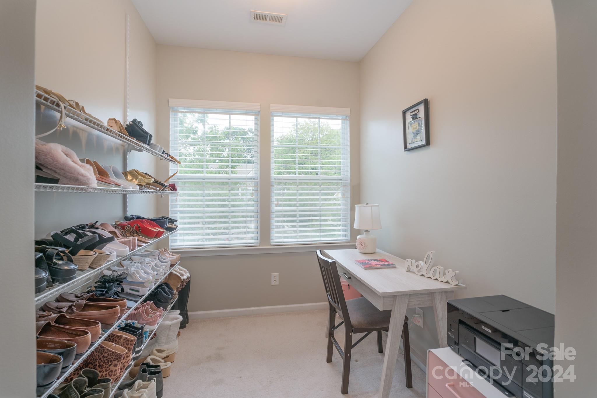 925 Treasure Court Fort Mill, SC 29708 - Photo 26 of 45 a view of a workspace with furniture and a window