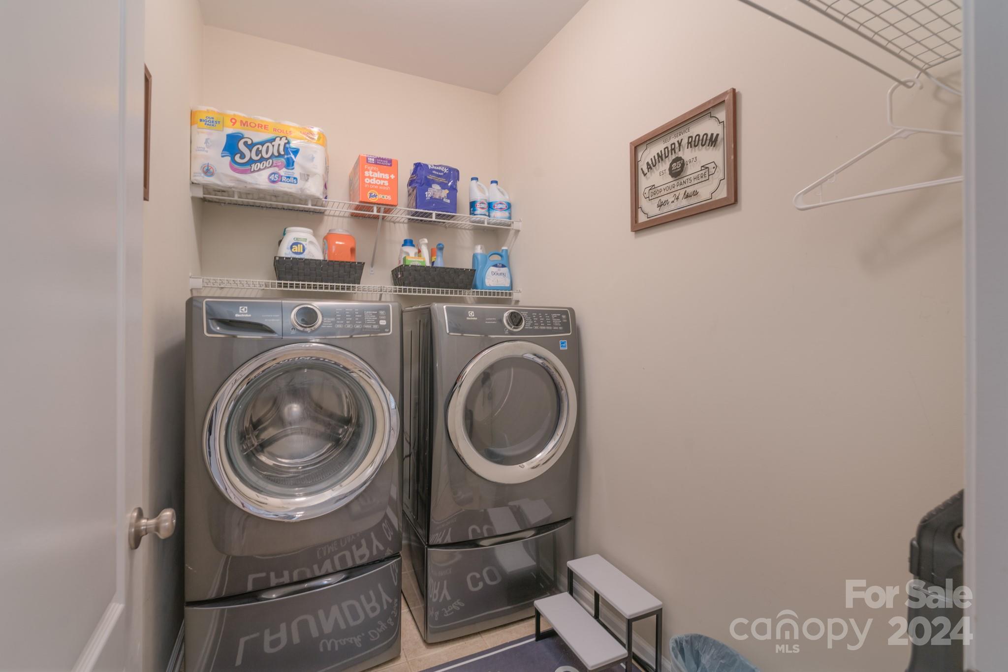 925 Treasure Court Fort Mill, SC 29708 - Photo 27 of 45 a utility room with dryer and washer