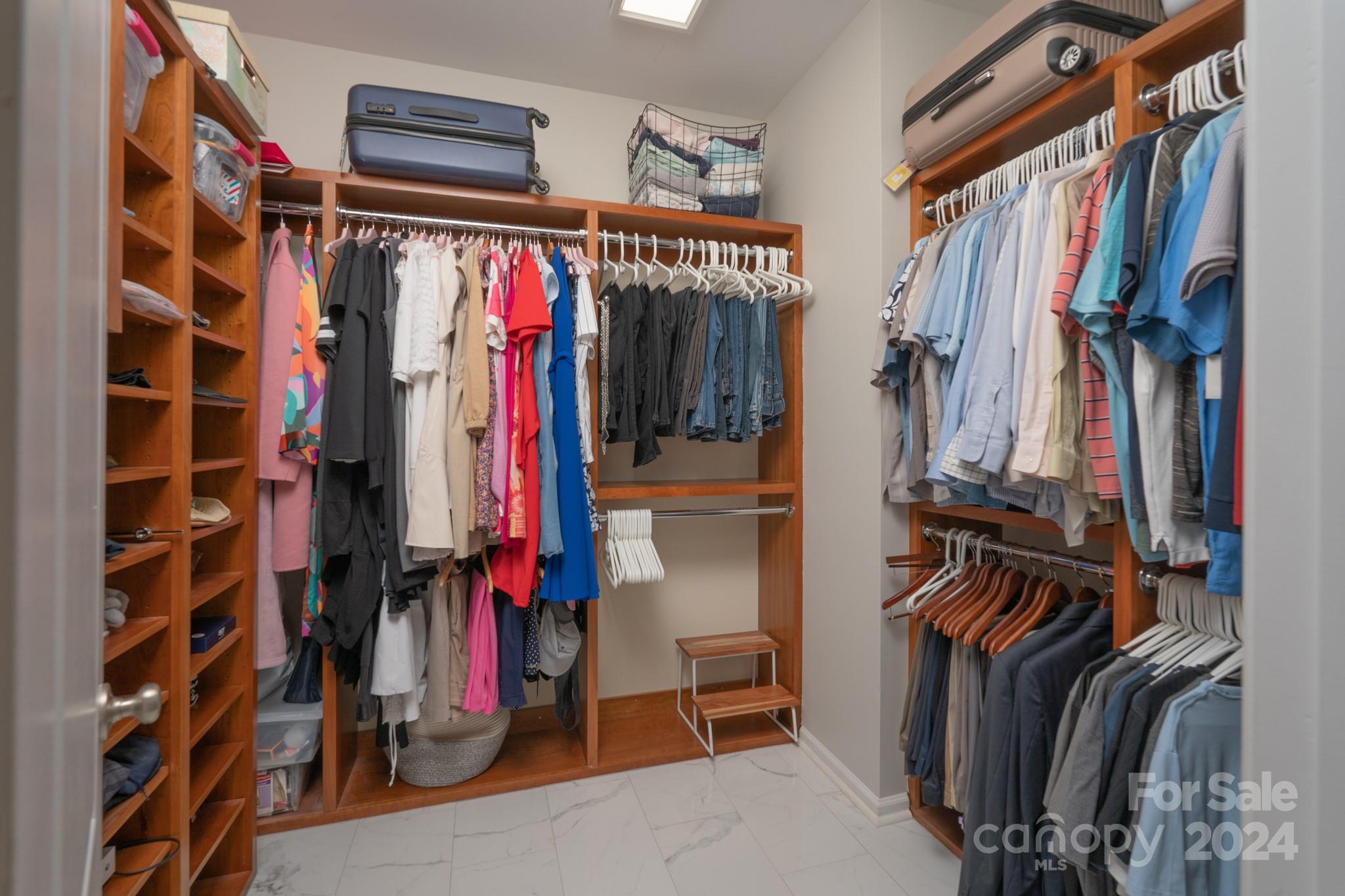 925 Treasure Court Fort Mill, SC 29708 - Photo 31 of 45 a view of walk in closet with clothes and shoes