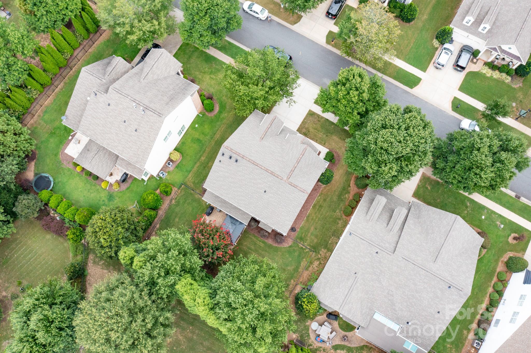 925 Treasure Court Fort Mill, SC 29708 - Photo 38 of 45 an aerial view of a house with outdoor space and a garden