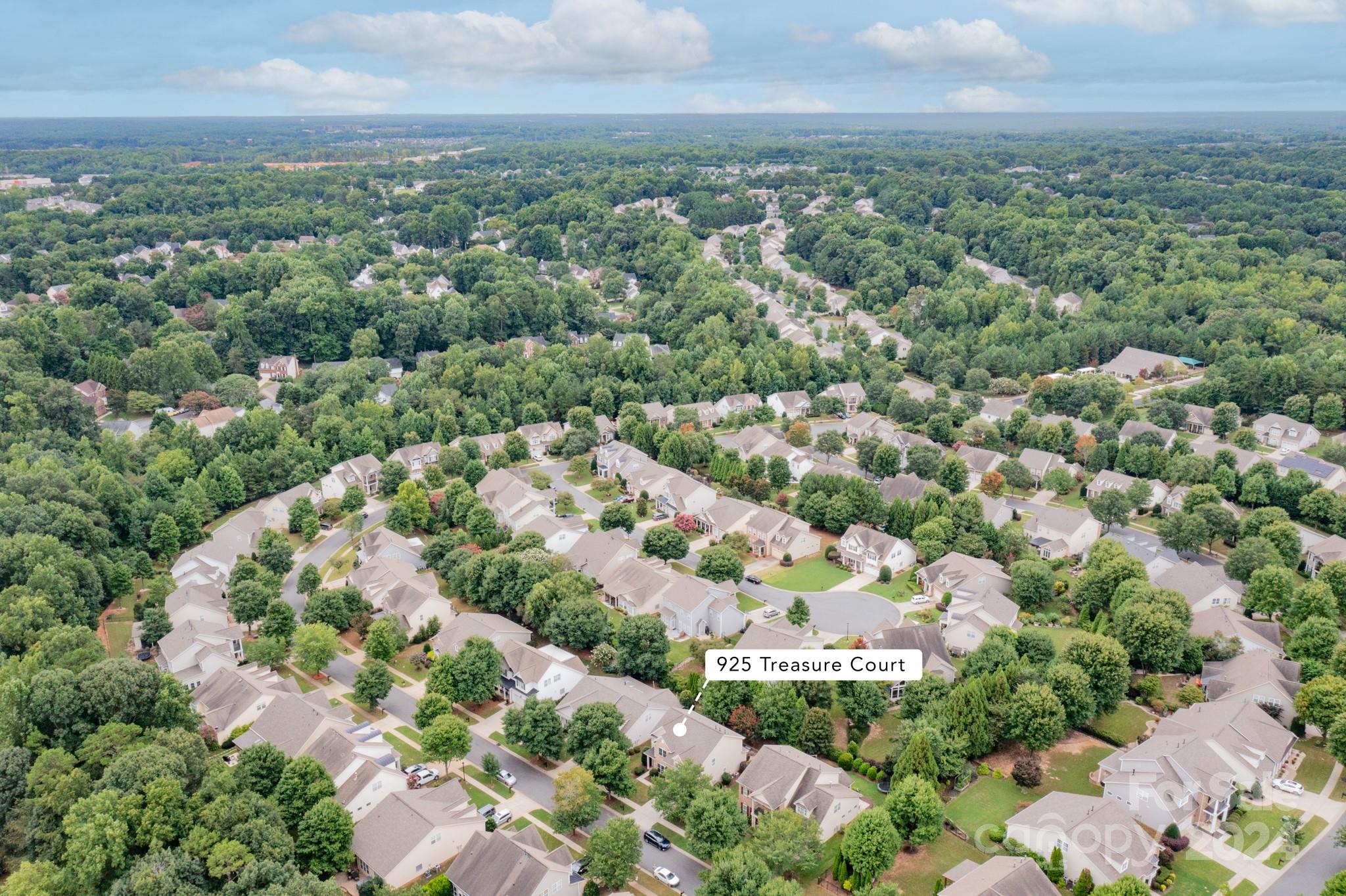925 Treasure Court Fort Mill, SC 29708 - Photo 44 of 45 an aerial view of a city with lots of residential buildings