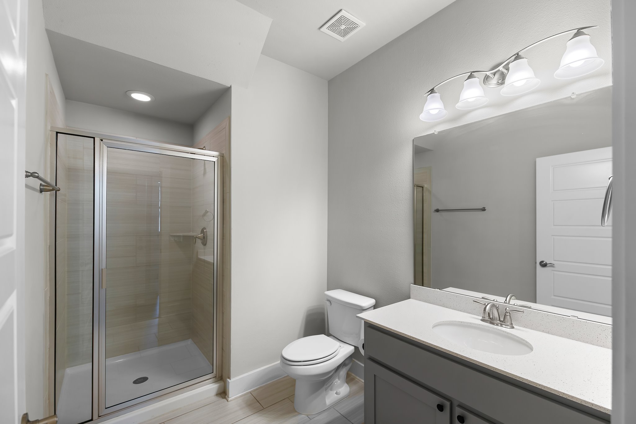 13800 Lyndhurst Street, Unit 211 Austin, TX 78717 - Photo 20 of 40 Full bath with vanity, a shower stall, and recessed lighting