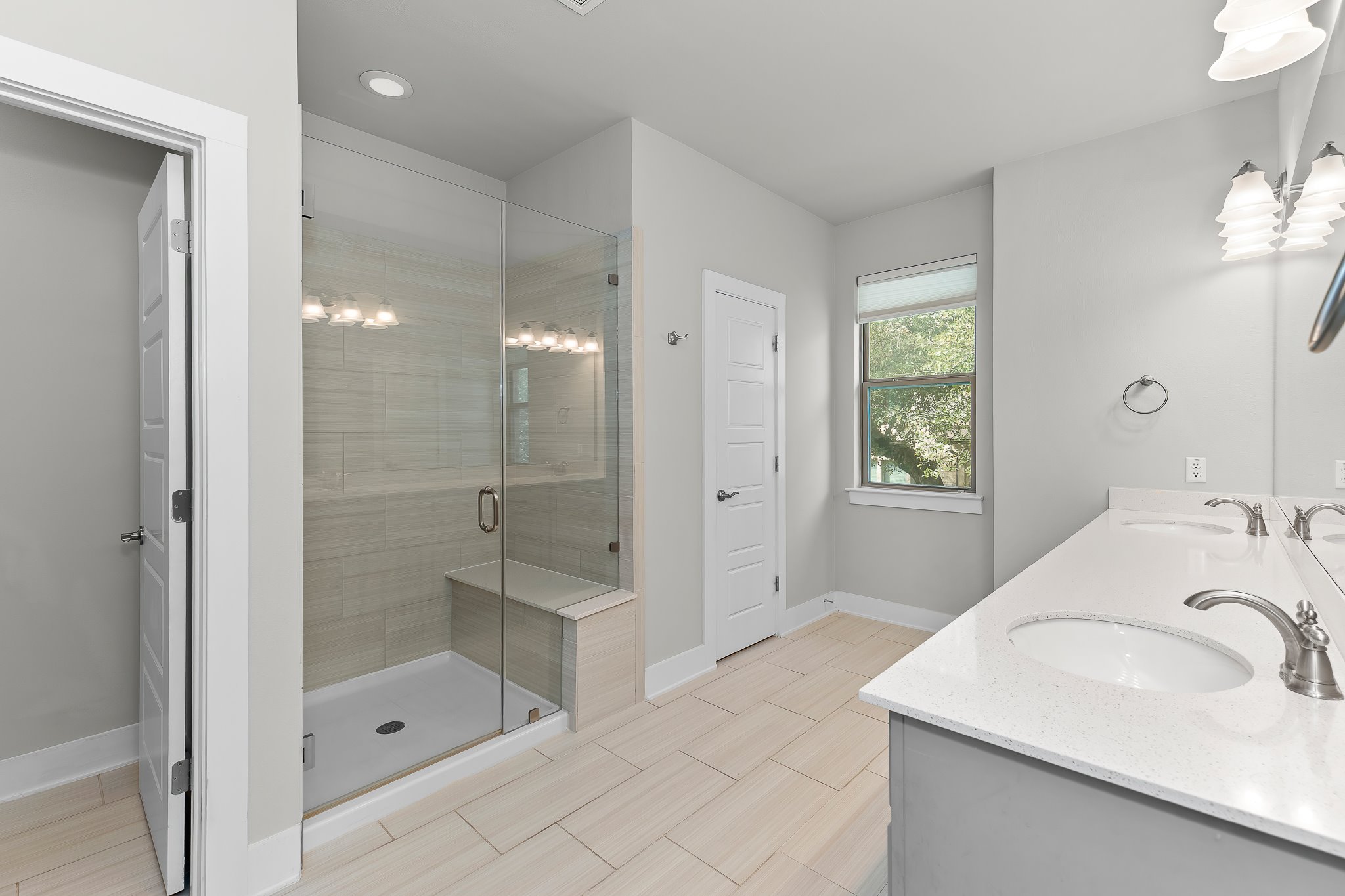 13800 Lyndhurst Street, Unit 211 Austin, TX 78717 - Photo 30 of 40 Full bath featuring double vanity and a stall shower