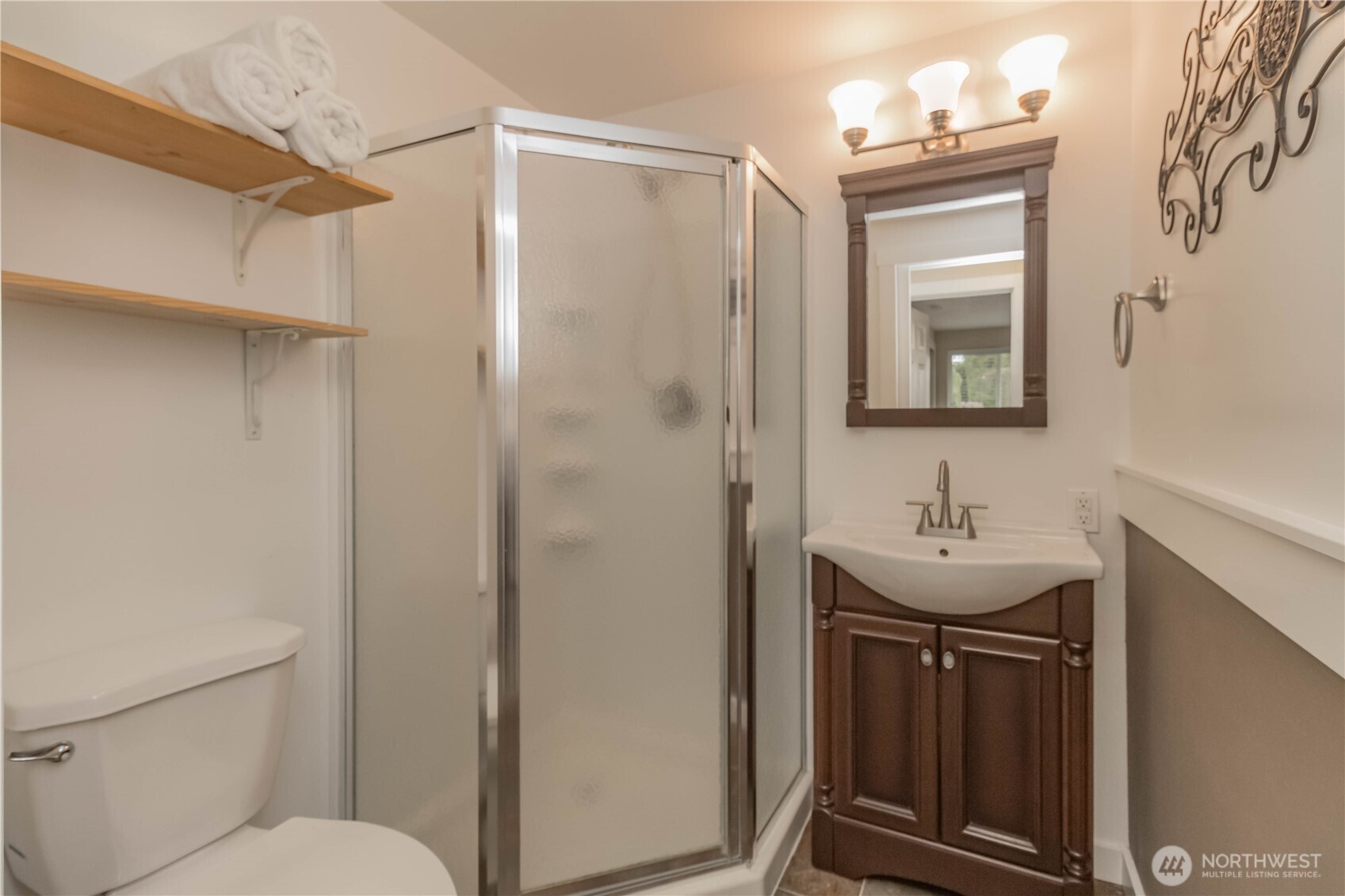1060 Lynnwood Avenue Northeast Renton, WA 98056 - Photo 33 of 40 a bathroom with a sink a toilet and shower
