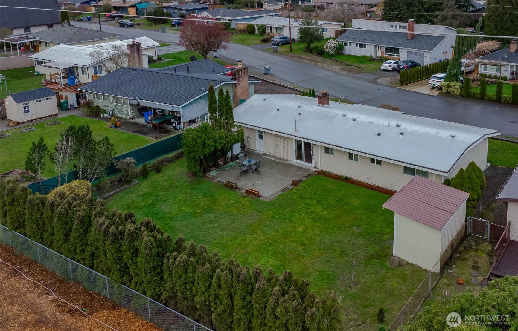 1060 Lynnwood Avenue Northeast Renton, WA 98056 - Photo 38 of 40 an aerial view of residential houses with outdoor space and street view