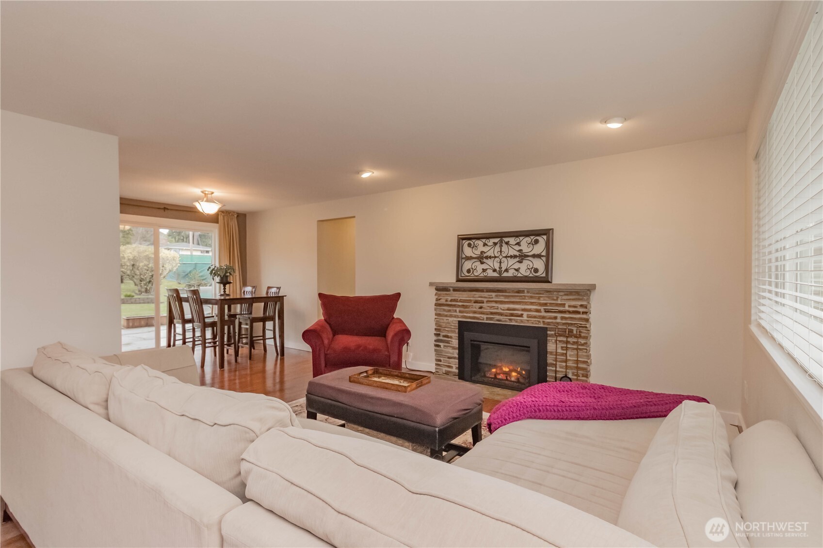 1060 Lynnwood Avenue Northeast Renton, WA 98056 - Photo 6 of 40 a living room with furniture or fireplace and a table