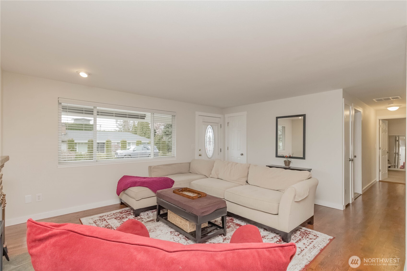 1060 Lynnwood Avenue Northeast Renton, WA 98056 - Photo 8 of 40 a living room with furniture and a large window