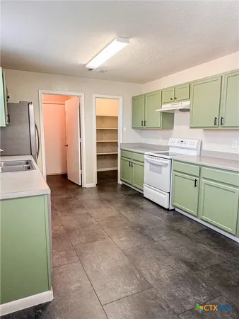 a room with storage and utility room