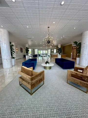 a view of a hallway with a bathroom