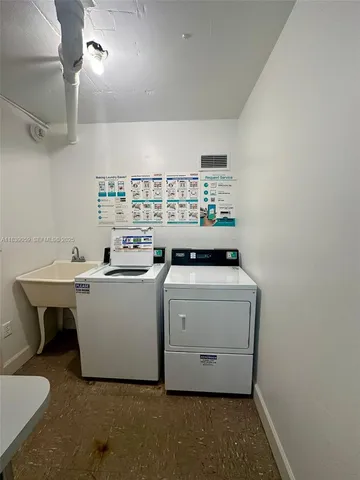 a view of a hallway with a bathroom