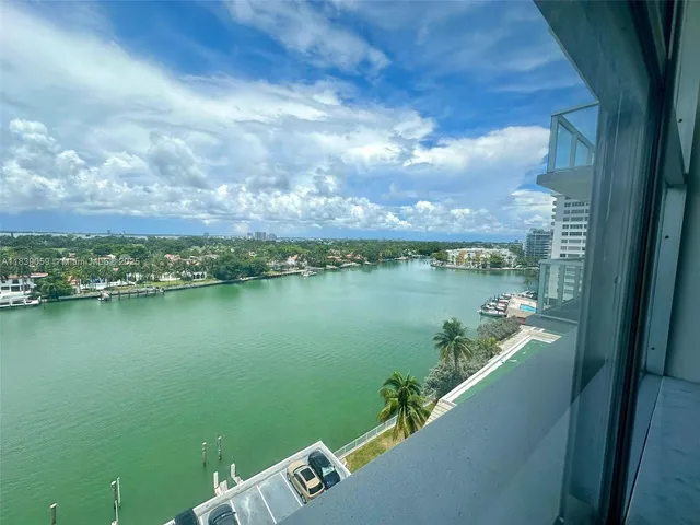 a view of swimming pool from a balcony
