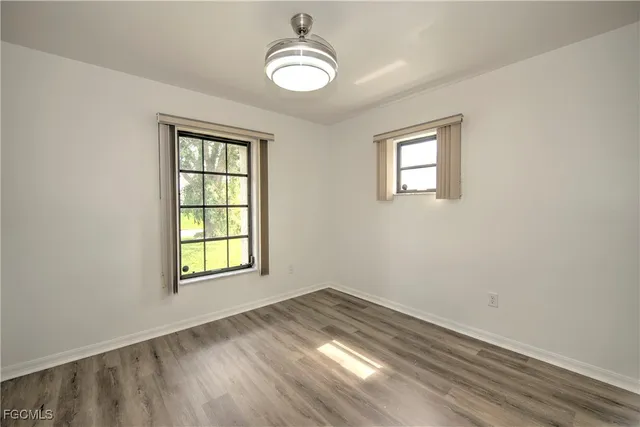 an empty room with windows