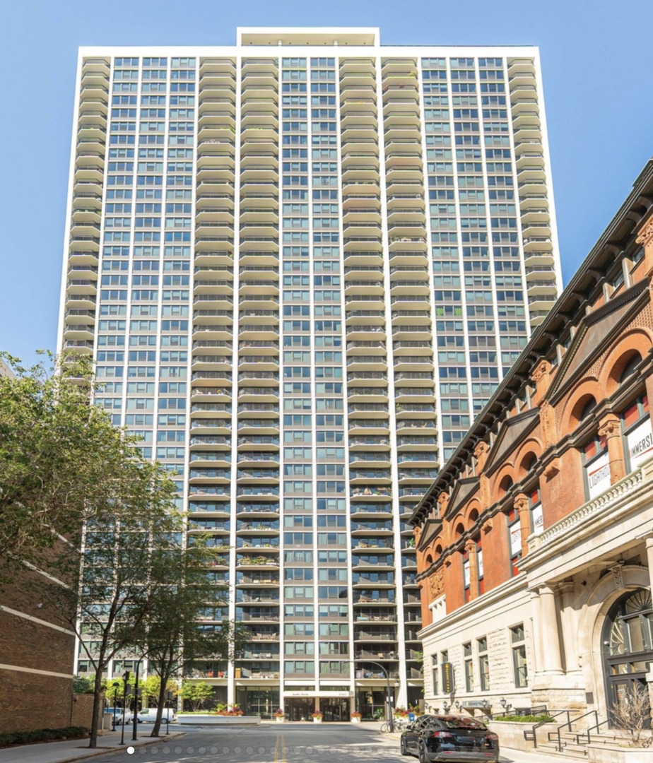 a front view of a building with glass windows