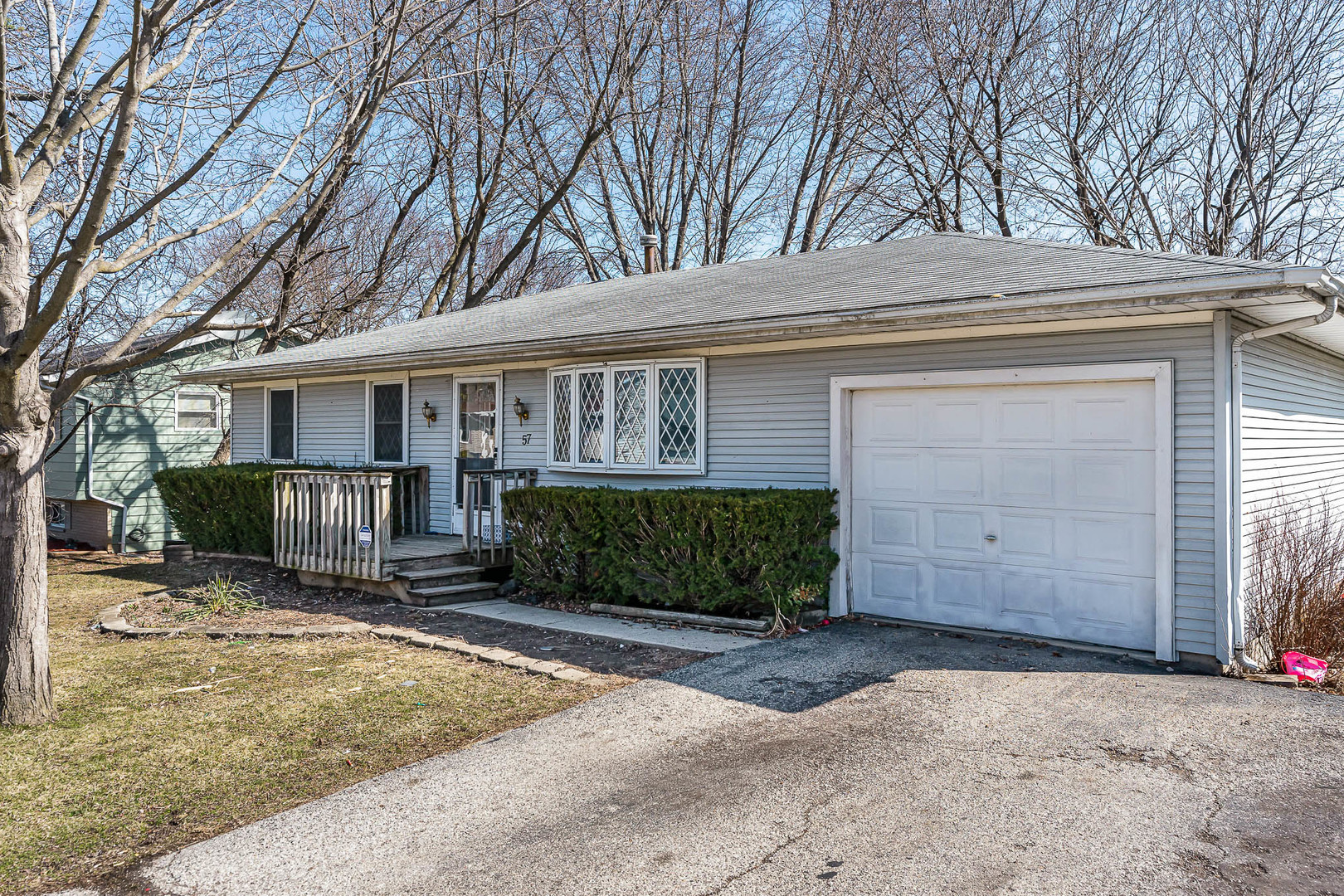 57 Tweed Road Fox Lake, IL 60020 - Photo 3 of 25 front view of a house with a yard