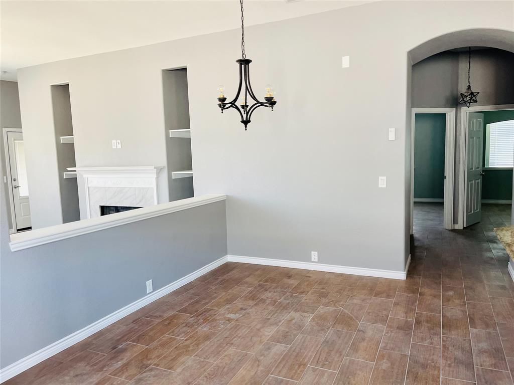 548 Kerry Street Crowley, TX 76036 - Photo 17 of 35 a view of a room with a ceiling fan