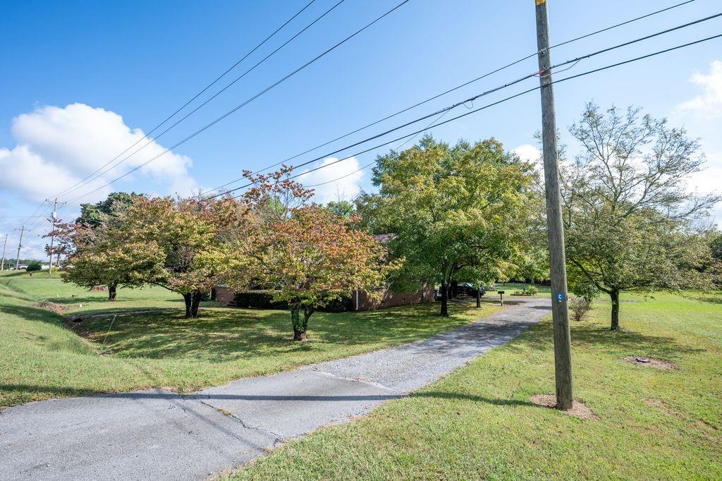 1316 Highway 41 Calhoun, GA 30701 - Photo 11 of 13 a garden view with a fountain