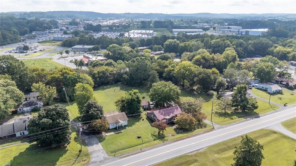 1316 Highway 41 Calhoun, GA 30701 - Photo 3 of 13 an aerial view of residential houses with outdoor space