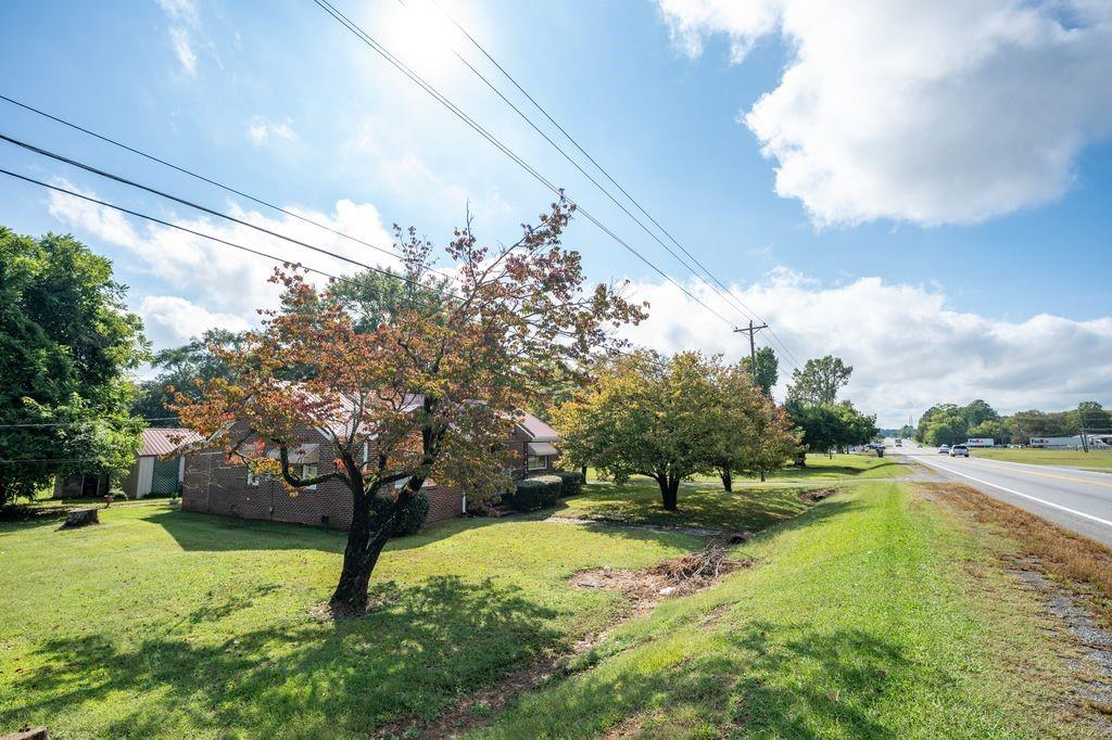 1316 Highway 41 Calhoun, GA 30701 - Photo 7 of 13 a view of a lake with a yard