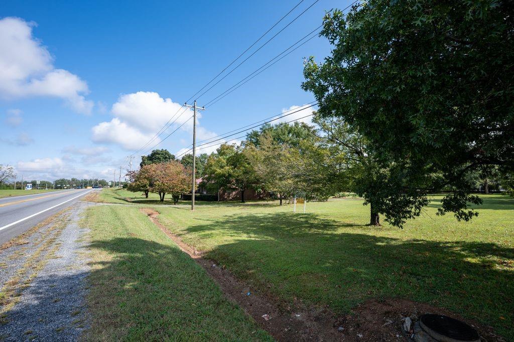1316 Highway 41 Calhoun, GA 30701 - Photo 9 of 13 a view of a golf course with a lake view