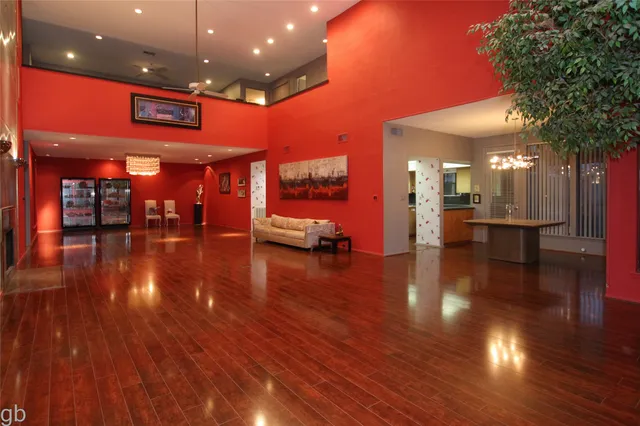 a view of a lobby with black carpet