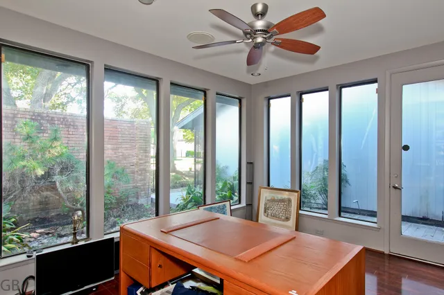 a view of a room with a large window