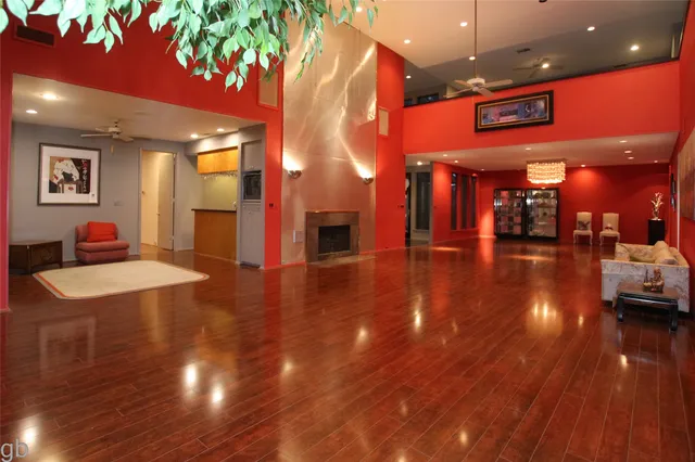 a lobby with furniture and wooden floor