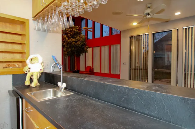 a view of a living room and bathroom