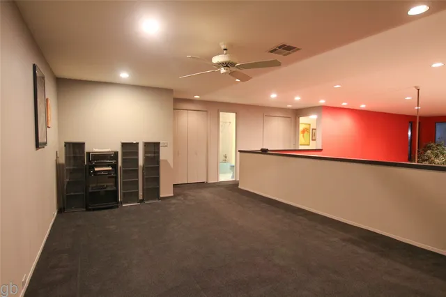 a view of an empty room with space and a window