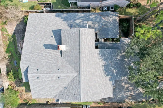 a aerial view of a house with a patio