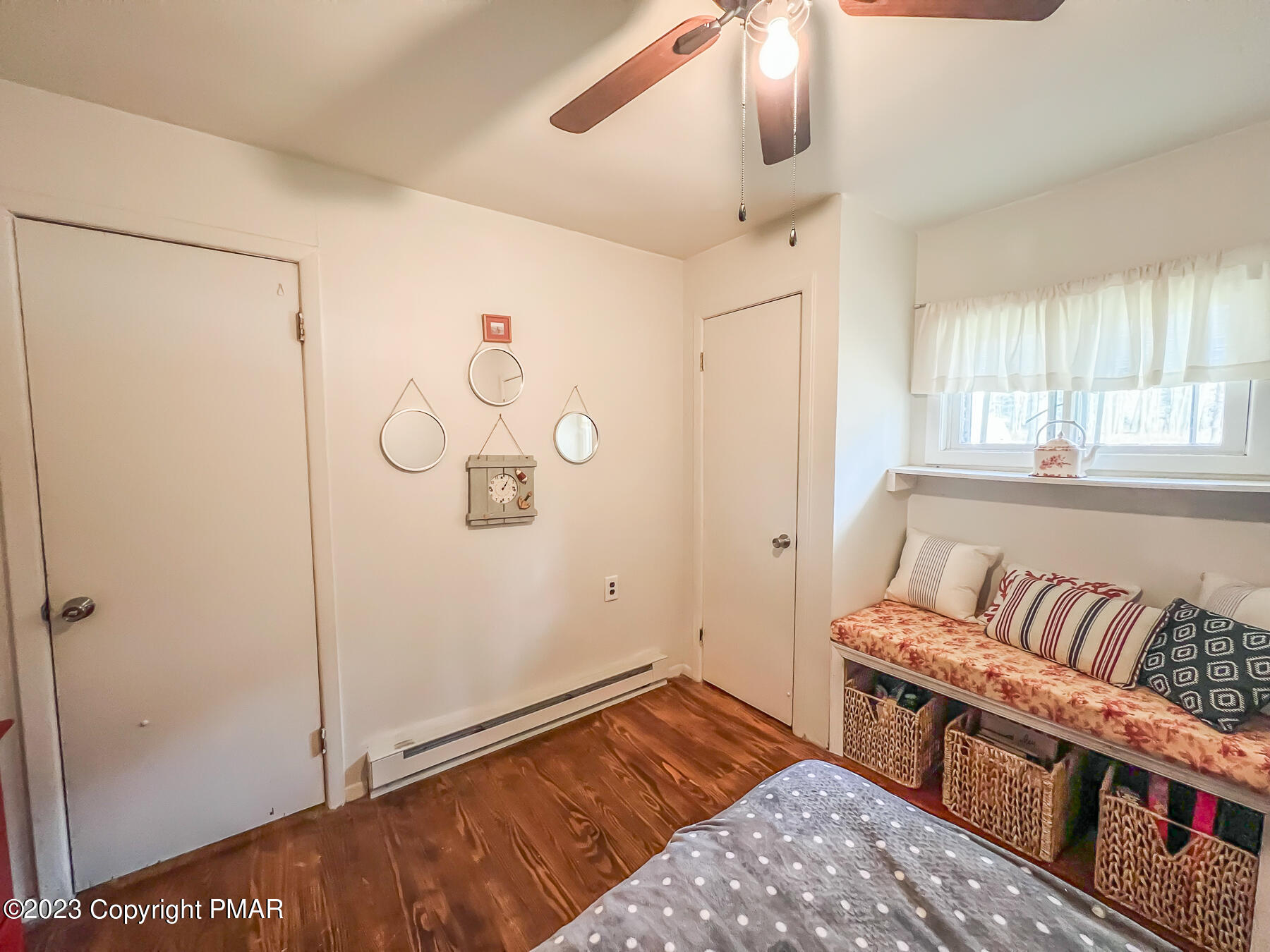216 Sutton Place Pocono Summit, PA 18346 - Photo 25 of 34 a bedroom with a bed and window