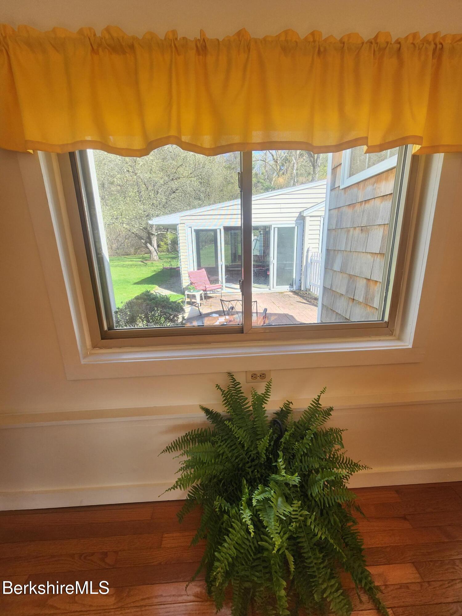 16 East New Lenox Road Lenox, MA 01240 - Photo 20 of 31 a view of a house with a ocean view