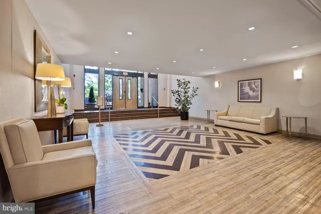 a view of a living room and dining room