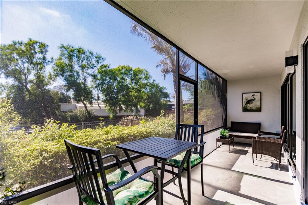 600 Neapolitan Way, Unit 152 Naples, FL 34103 - Photo 19 of 41 a view of an outdoor seating area