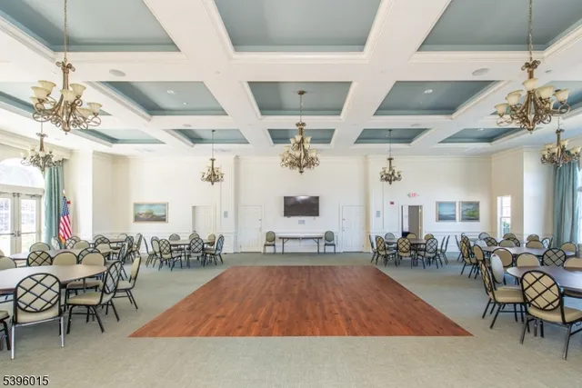 a view of a parked cars in front of a house