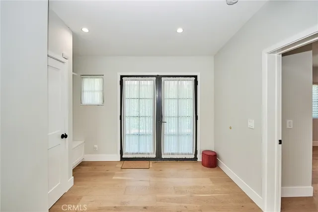 a view of a room with an entryway