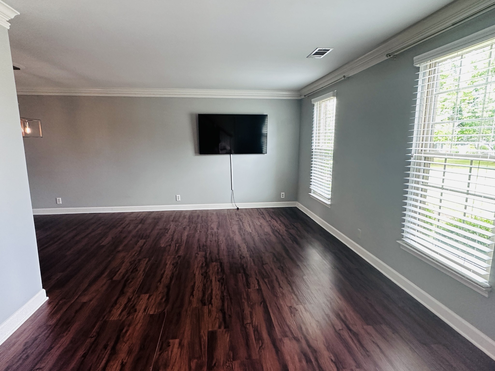 614 General George Patton Road Nashville, TN 37221 - Photo 6 of 27 a view of an empty room with wooden floor and a window