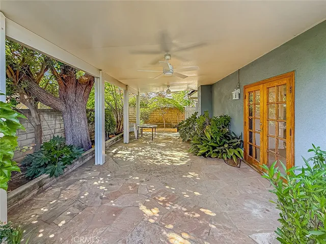 a view of a garden with patio