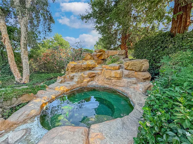 an aerial view of a house with outdoor space and street view
