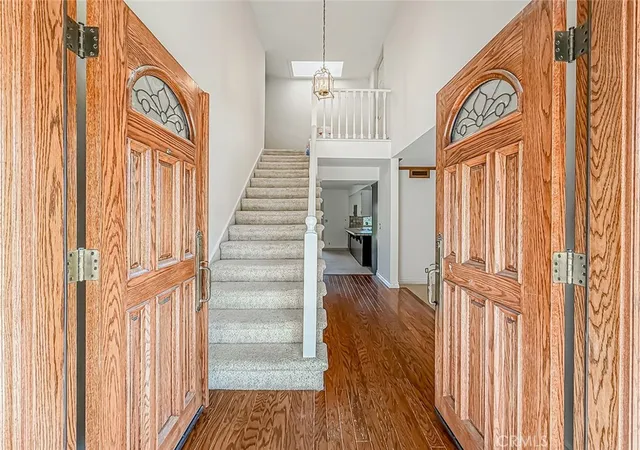 a view of entryway with wooden floor