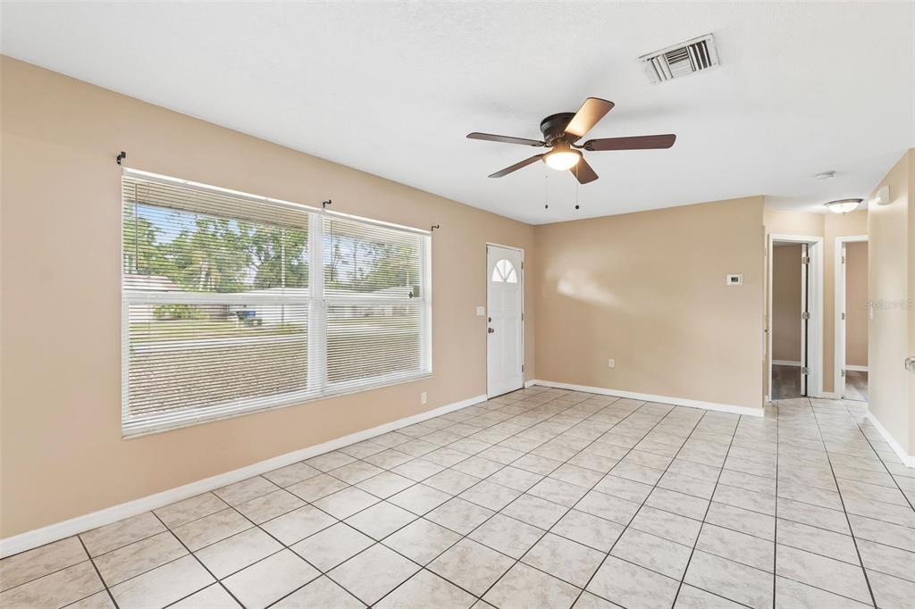 4018 Prado Drive Sarasota, FL 34235 - Photo 13 of 74 a view of an empty room with a window