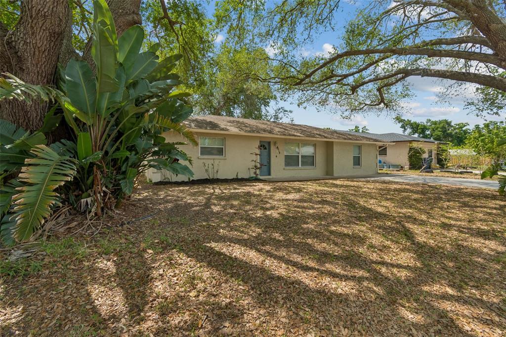 4018 Prado Drive Sarasota, FL 34235 - Photo 3 of 74 a view of a house with a tree