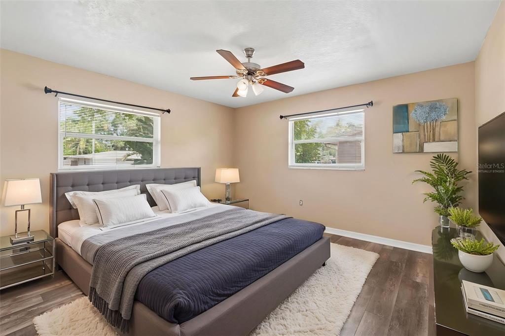 4018 Prado Drive Sarasota, FL 34235 - Photo 42 of 74 a bedroom with bed furniture and a window